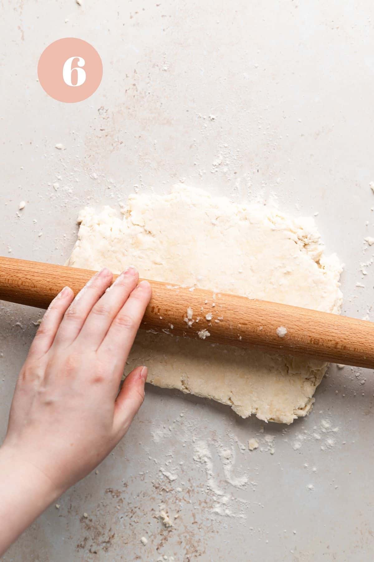 rolling the butter biscuit dough.