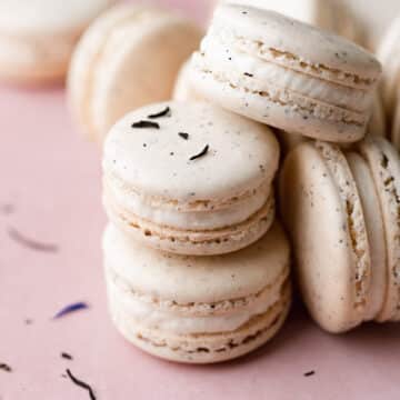 earl grey tea macarons stacked on top of each other.