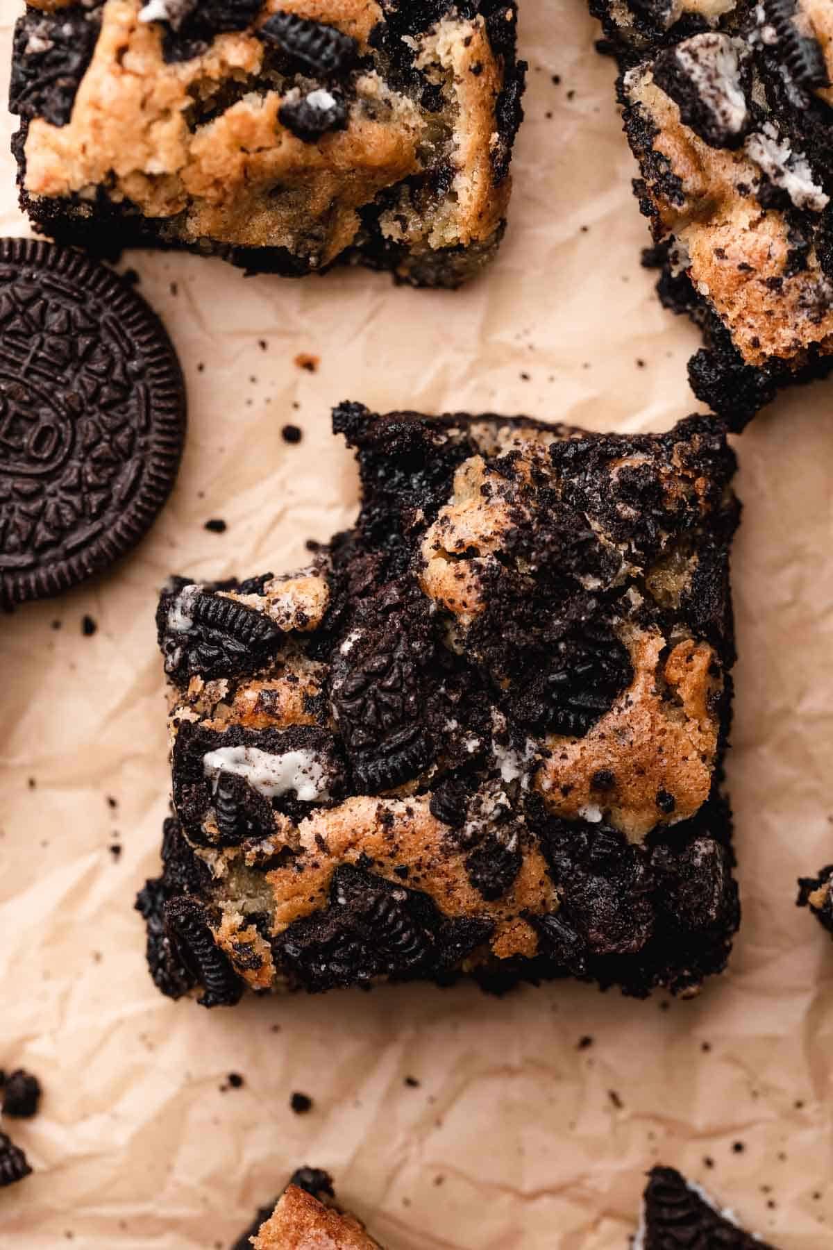 an oreo brookie with a bite taken out of it.