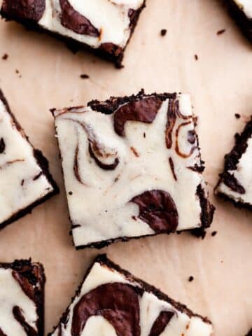 cheesecake marble brownie on a piece of parchment paper.