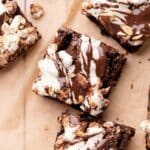 rocky road brownies on a piece of parchment paper.