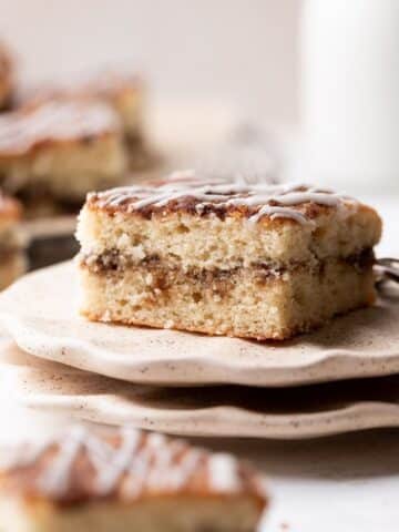 moist and chewy snickerdoodle coffee cake slice on a plate.