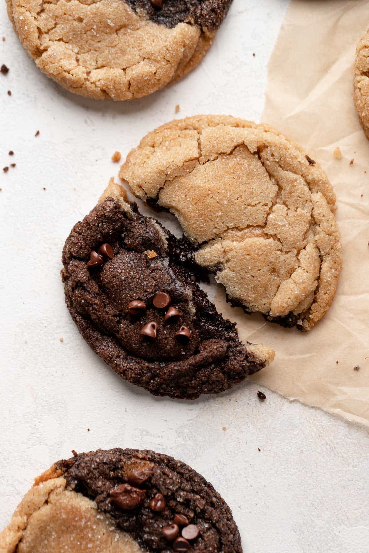 chocolate peanut butter swirled cookie broken in half.