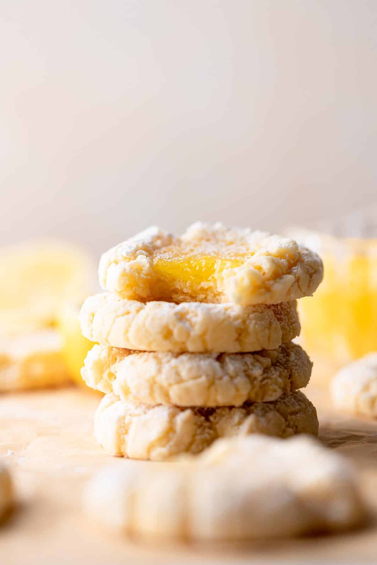 lemon bar cookies stacked on top of each other.