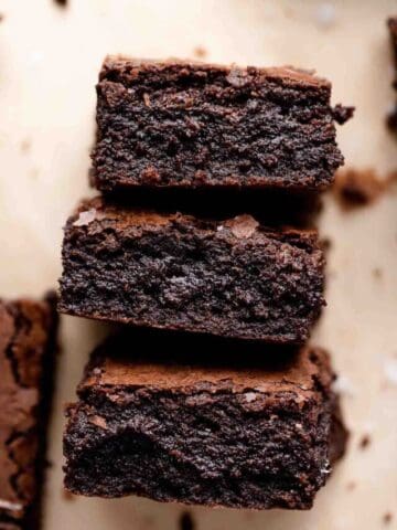three espresso brownies stacked on each other.