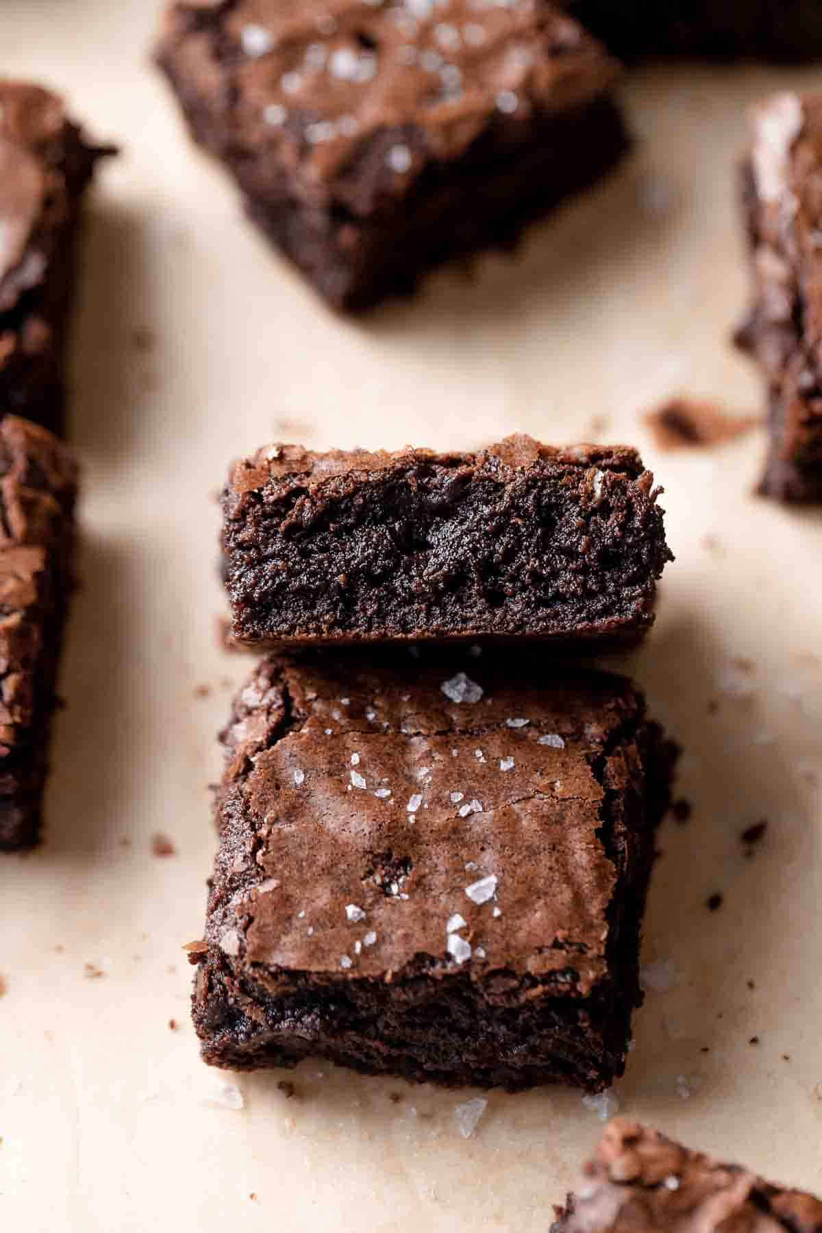 a few coffee brownies on parchment paper.