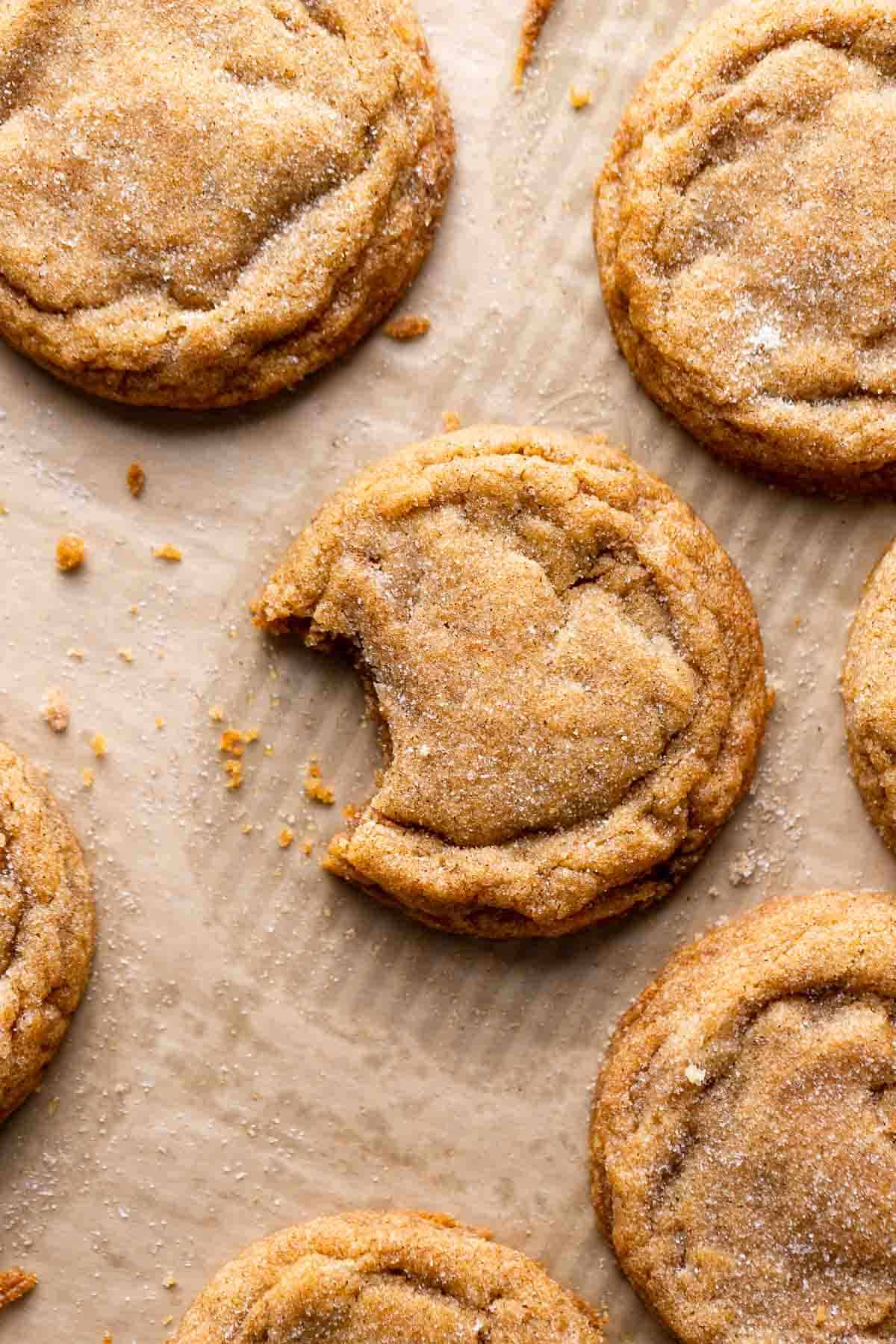 a baking tray with baked pumpkin cookies.