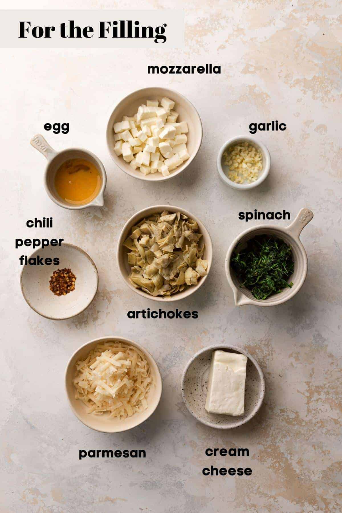 ingredients needed to make the spinach artichoke filling.