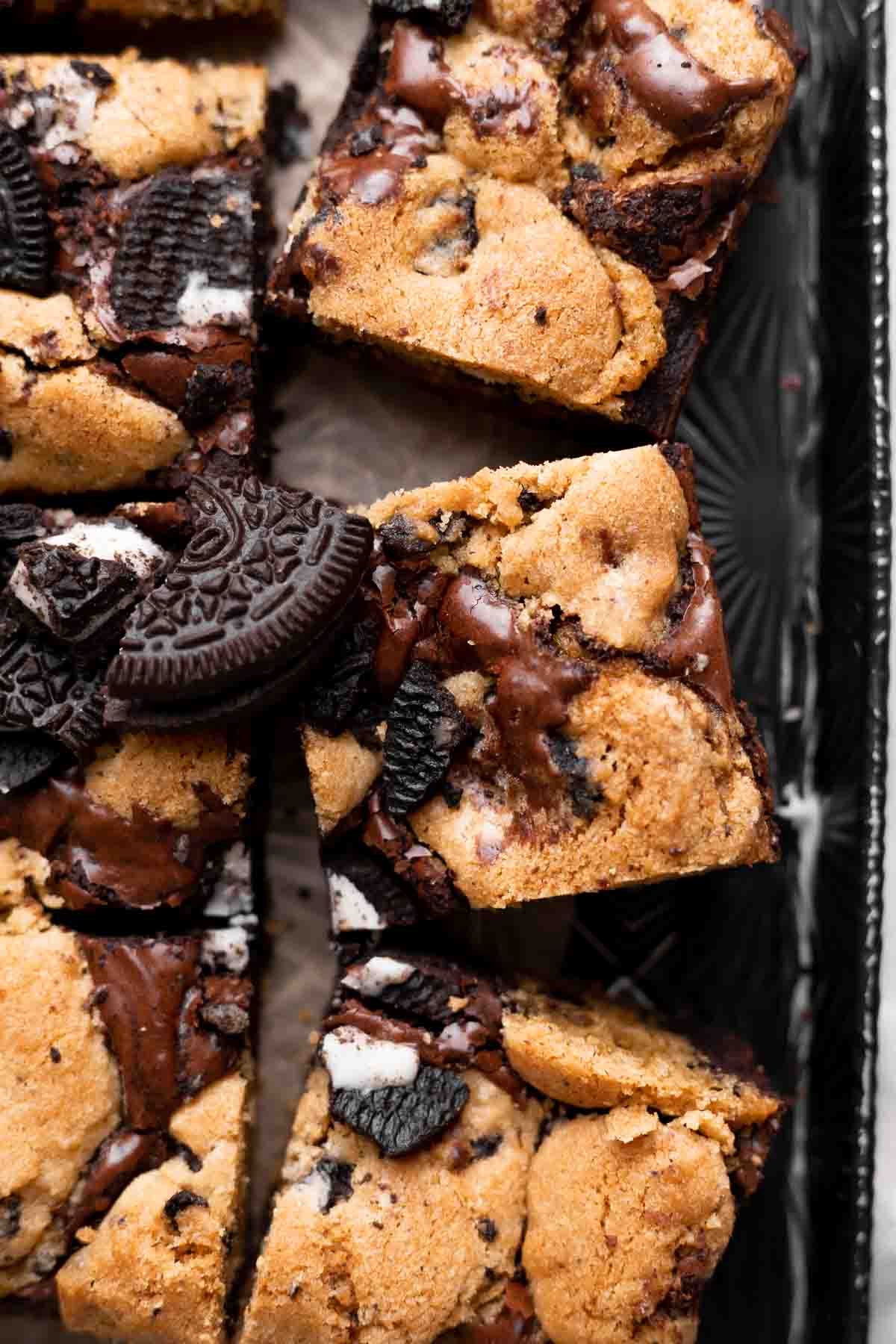 brookies cut into squares and topped with oreo cookies.