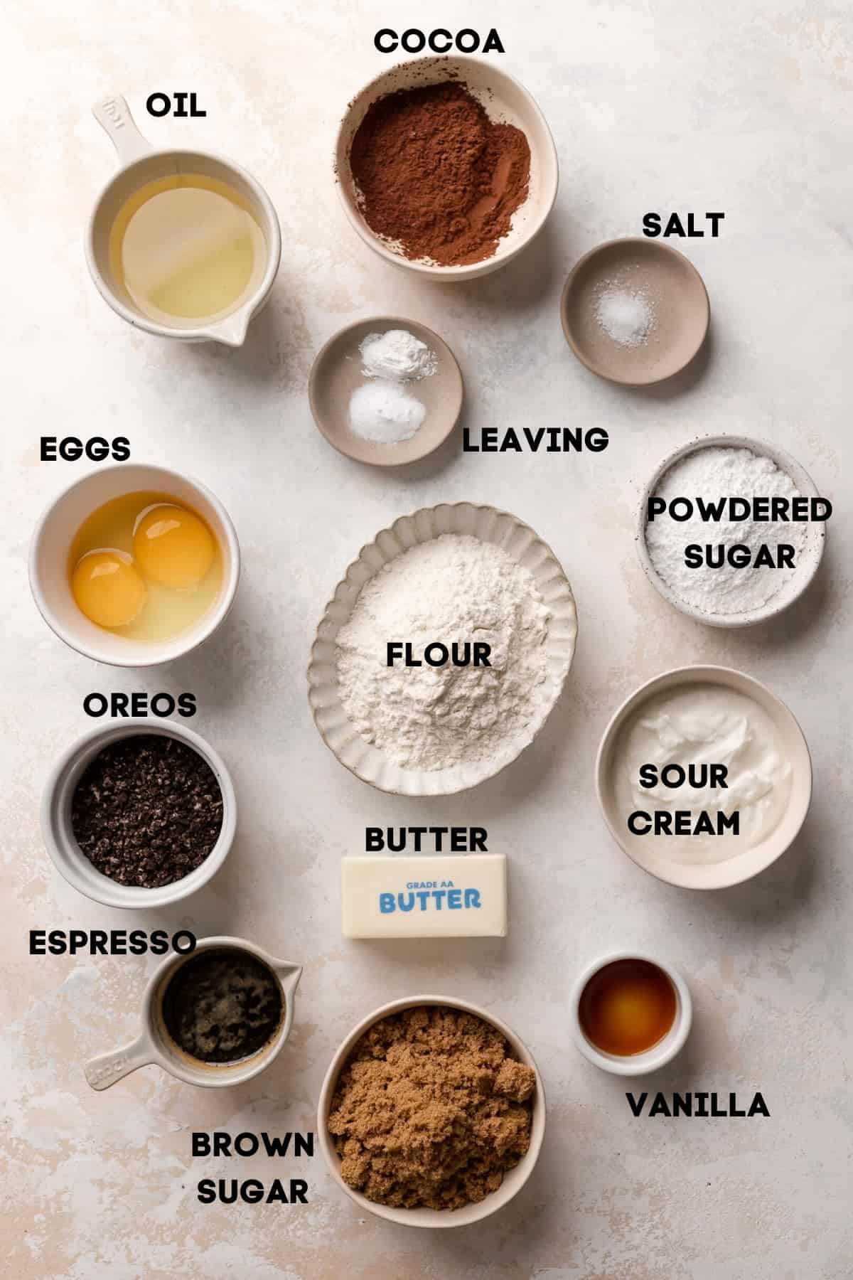 ingredients needed to make chocolate whoopie pies in bowls with labels.