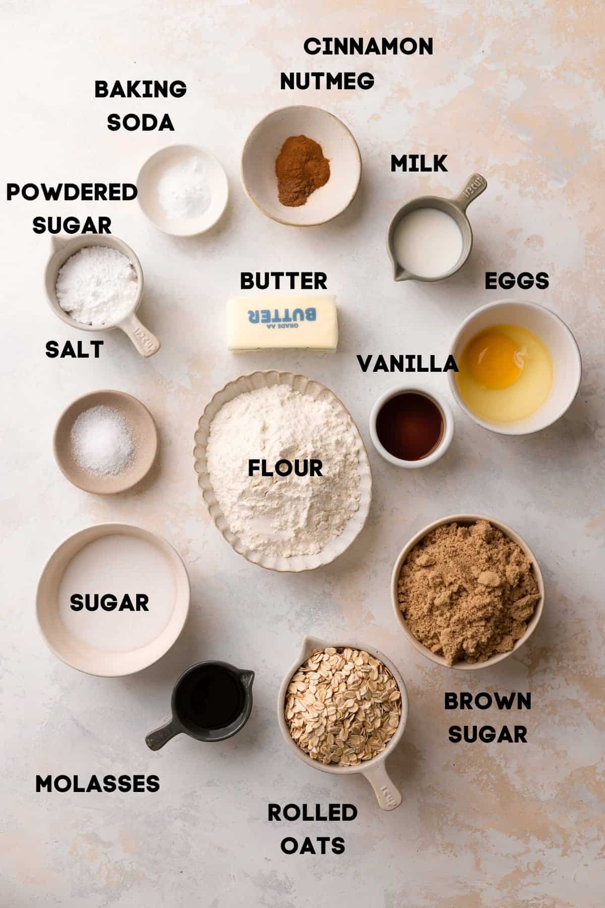 ingredients for iced oatmeal cookies in bowls with labels.