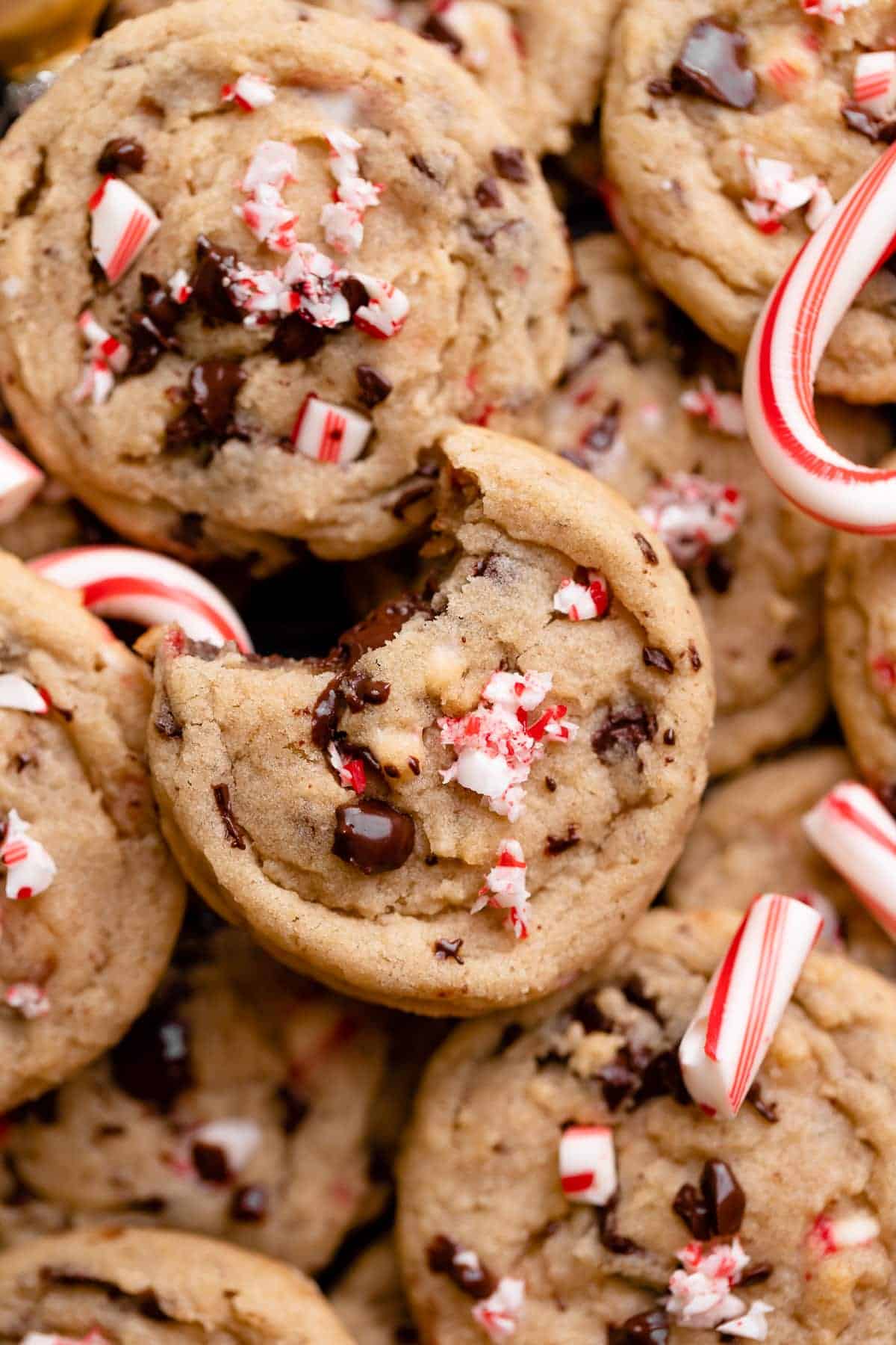 peppermint chocolate chip cookies topped with candy canes.