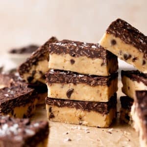 cookie dough bars stacked on top of each other.