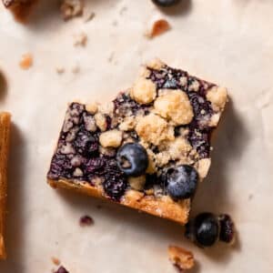 blueberry blondie with a bite taken out of it.
