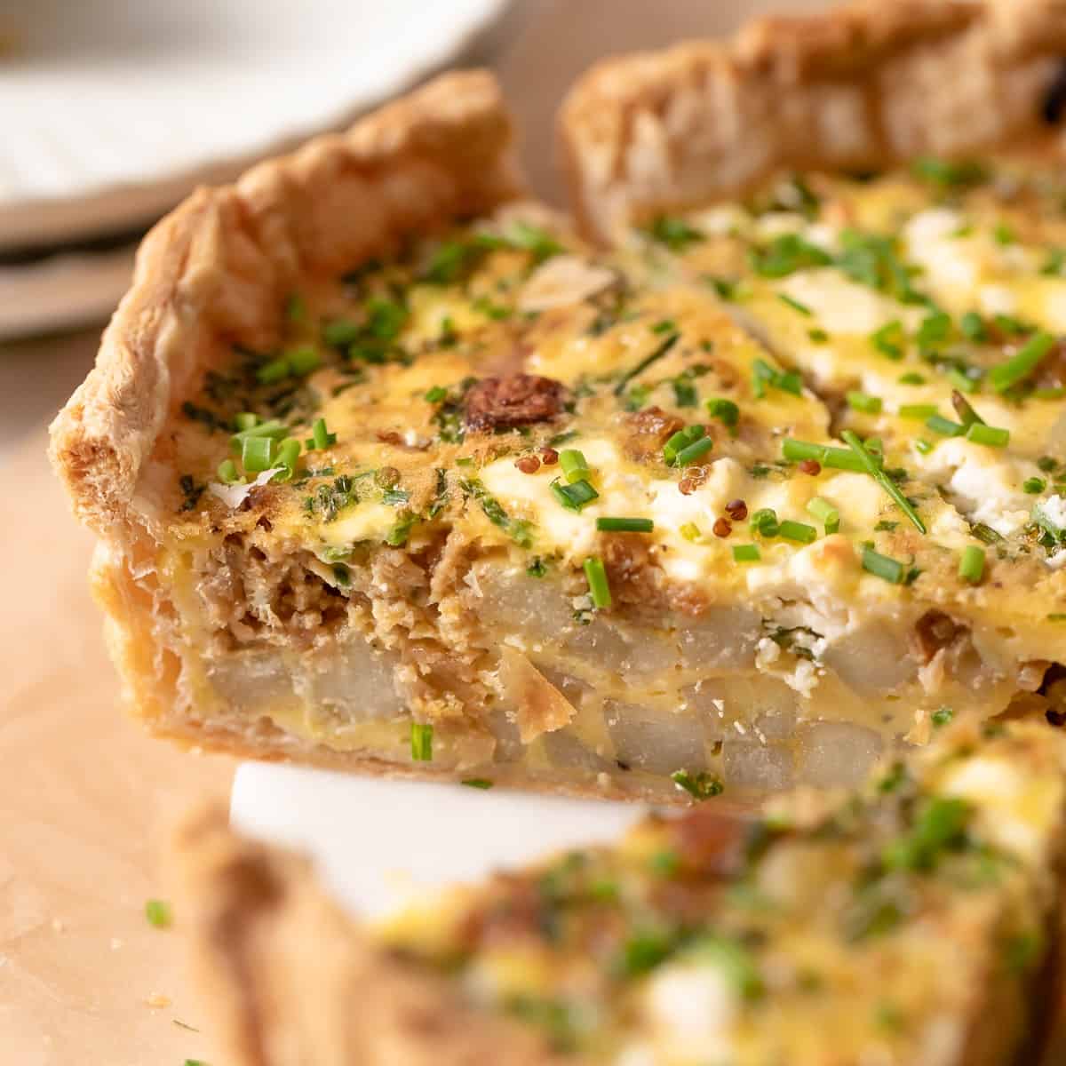 puff pastry quiche cut into slices.