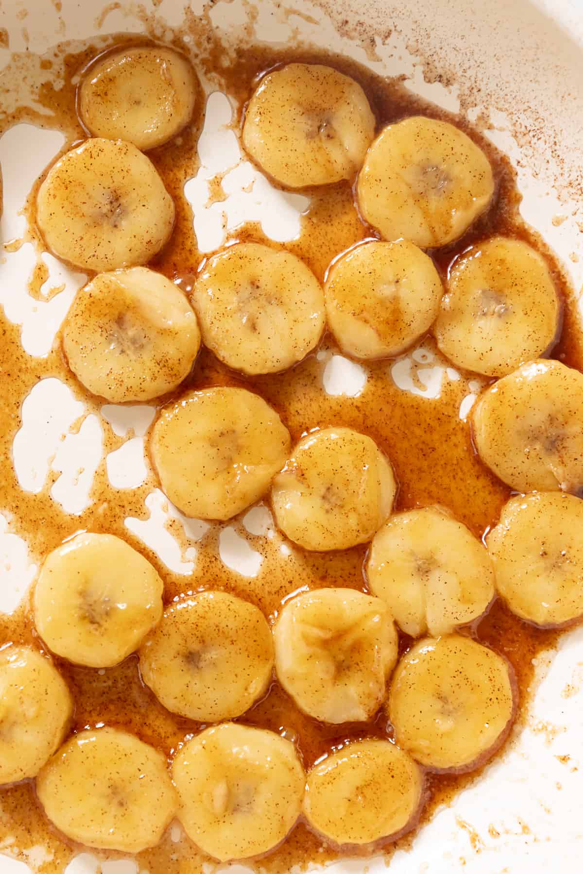 caramelized bananas in a pan.