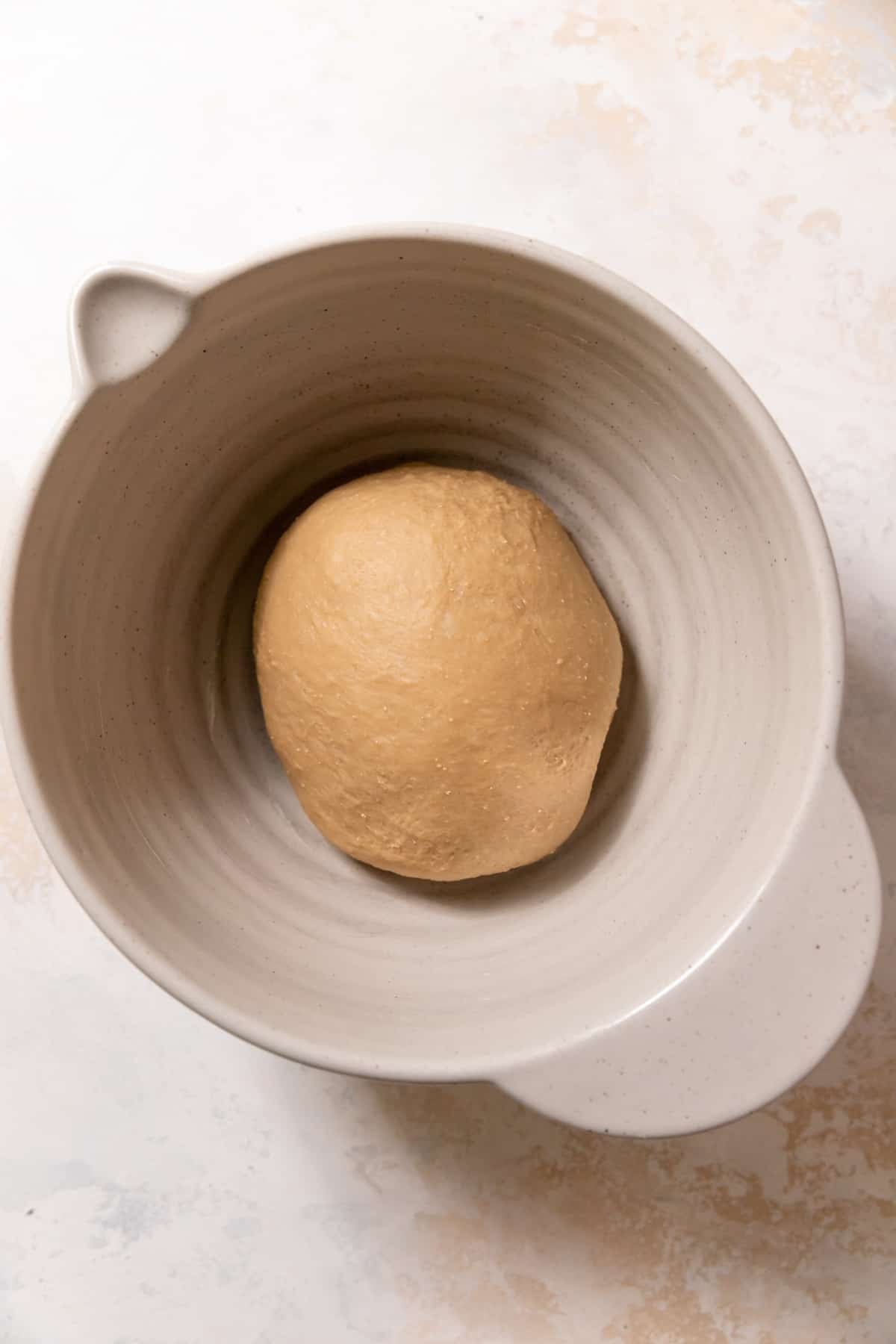 cinnamon roll dough in a bowl.
