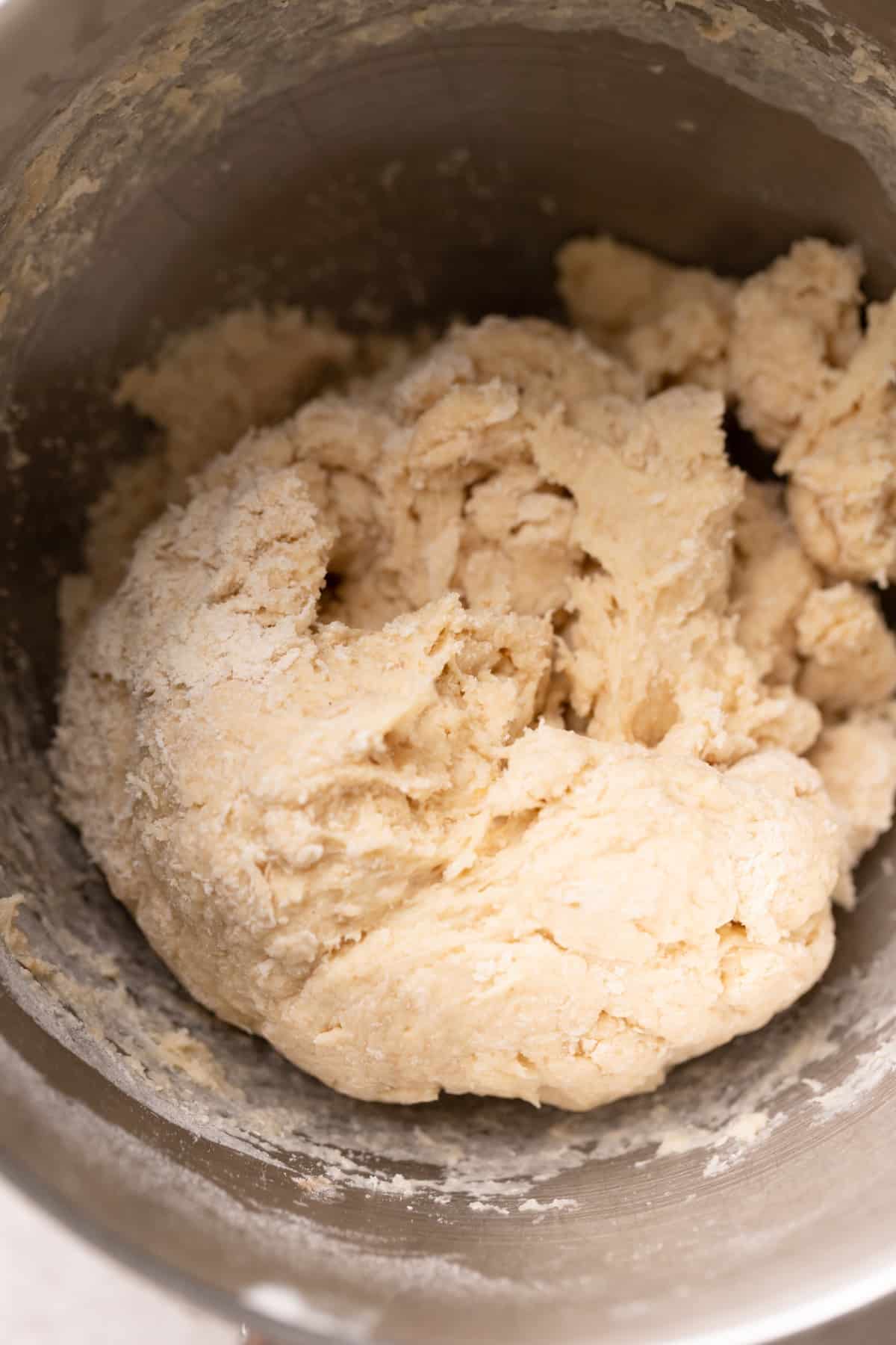 shaggy dough ball in a mixing bowl.
