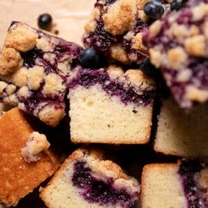 blueberry crumb cake cut into squares.