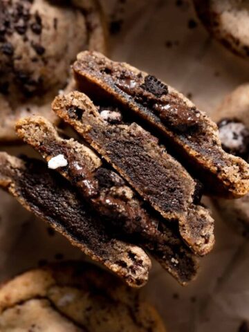 oreo chocolate chip cookies cut in half to show the gooey chocolate center.