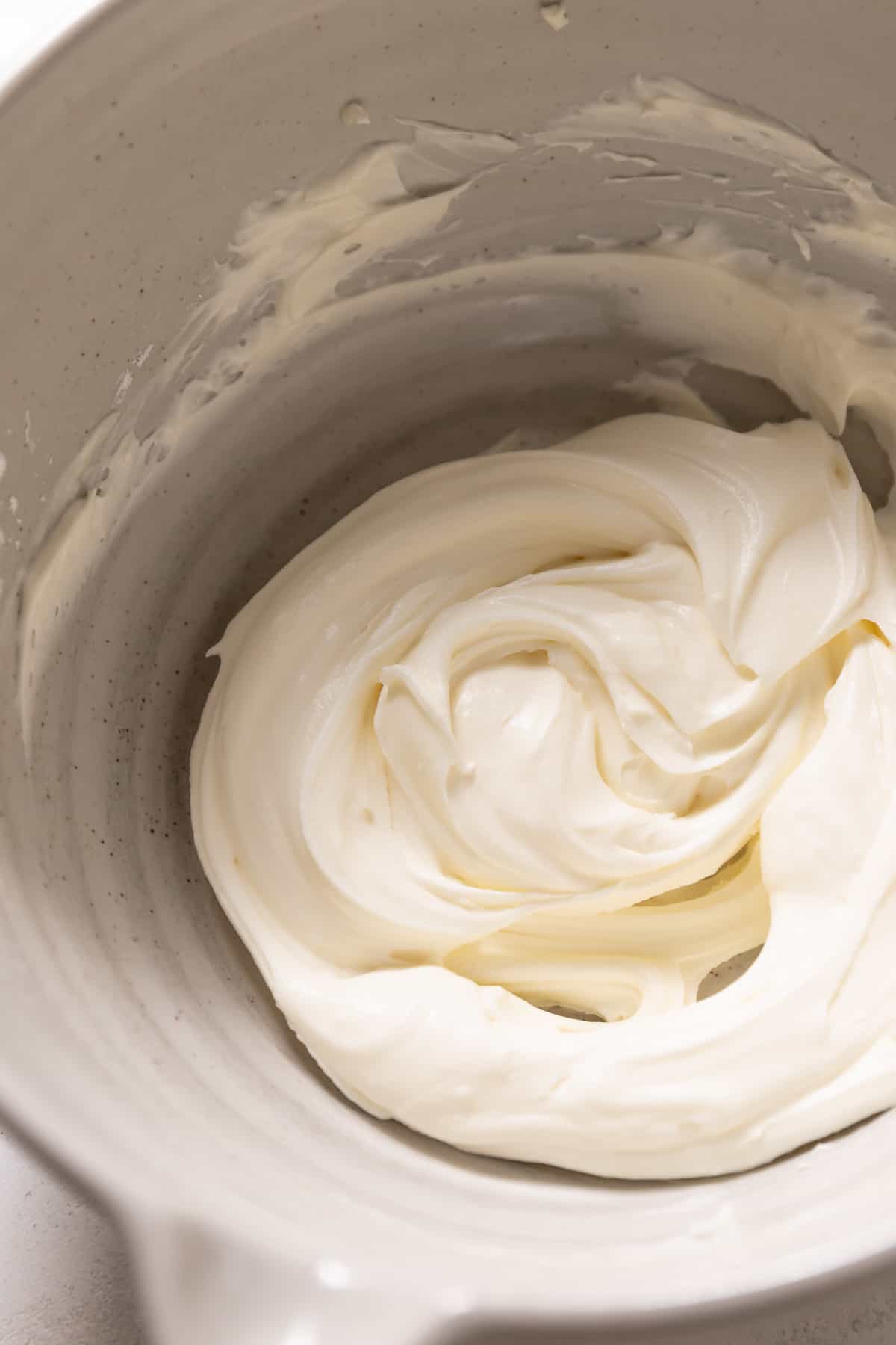 mascarpone frosting in a mixing bowl.
