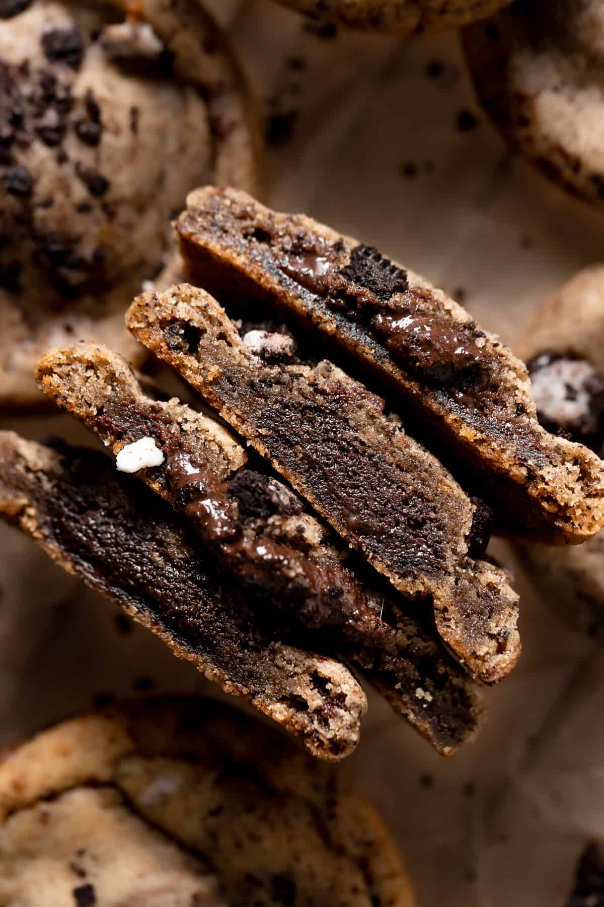oreo chocolate chip cookies cut in half to show the gooey chocolate center.