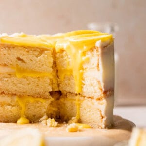 lemon bar cake with lemon curd and fresh lemon slices.
