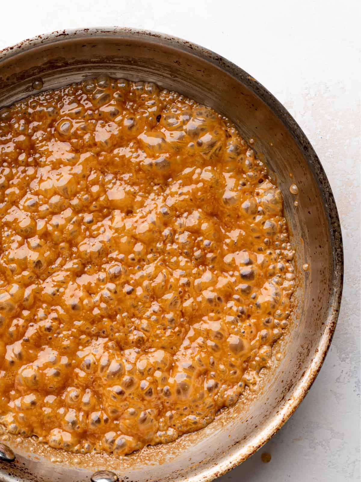 salted caramel in a sauce pan bubbling.