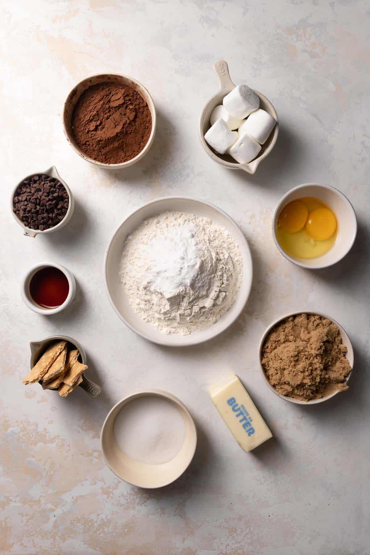 ingredients needed to make smores cookies in bowls.