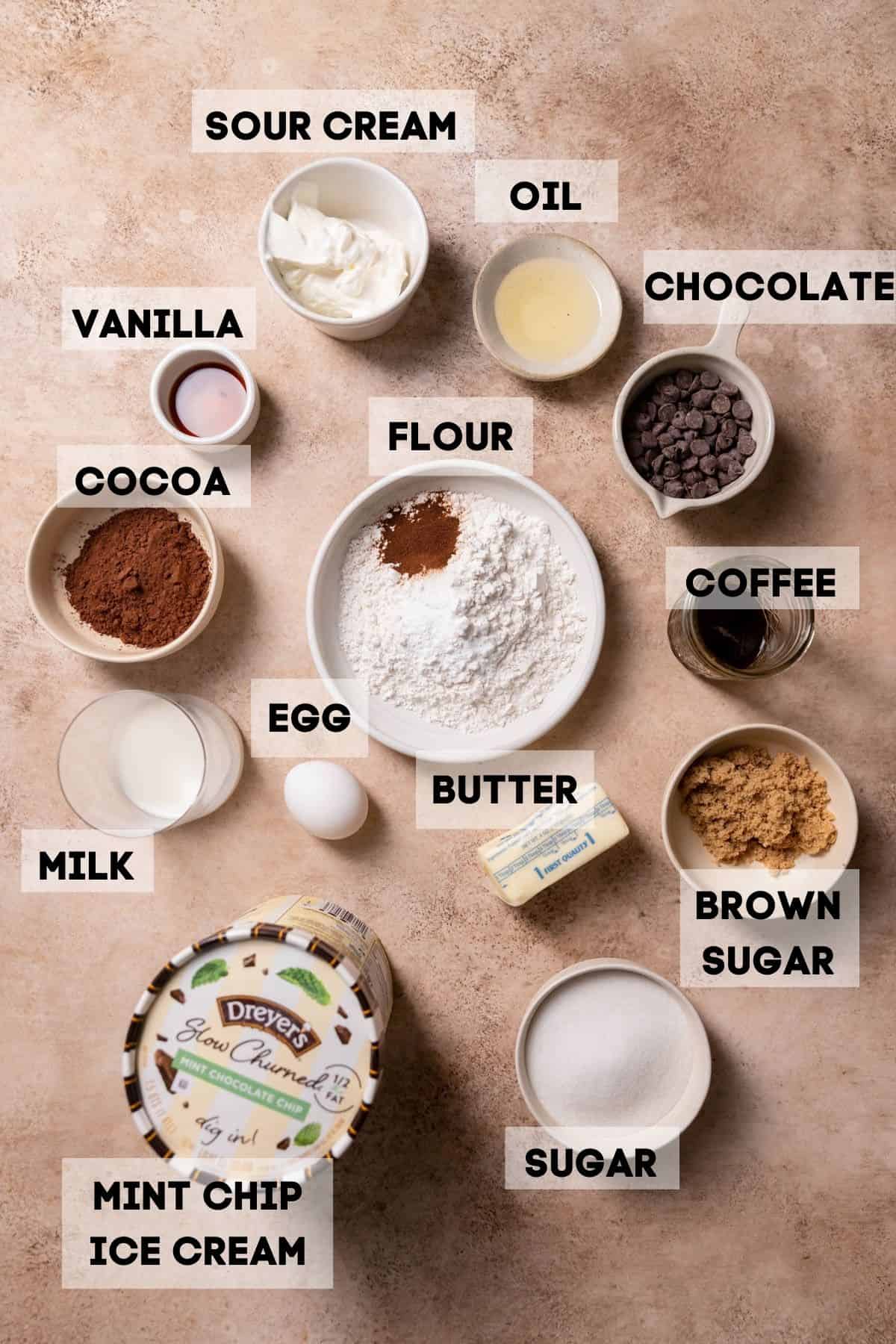 ingredients needed to make mint ice cream cake in bowls with labels.