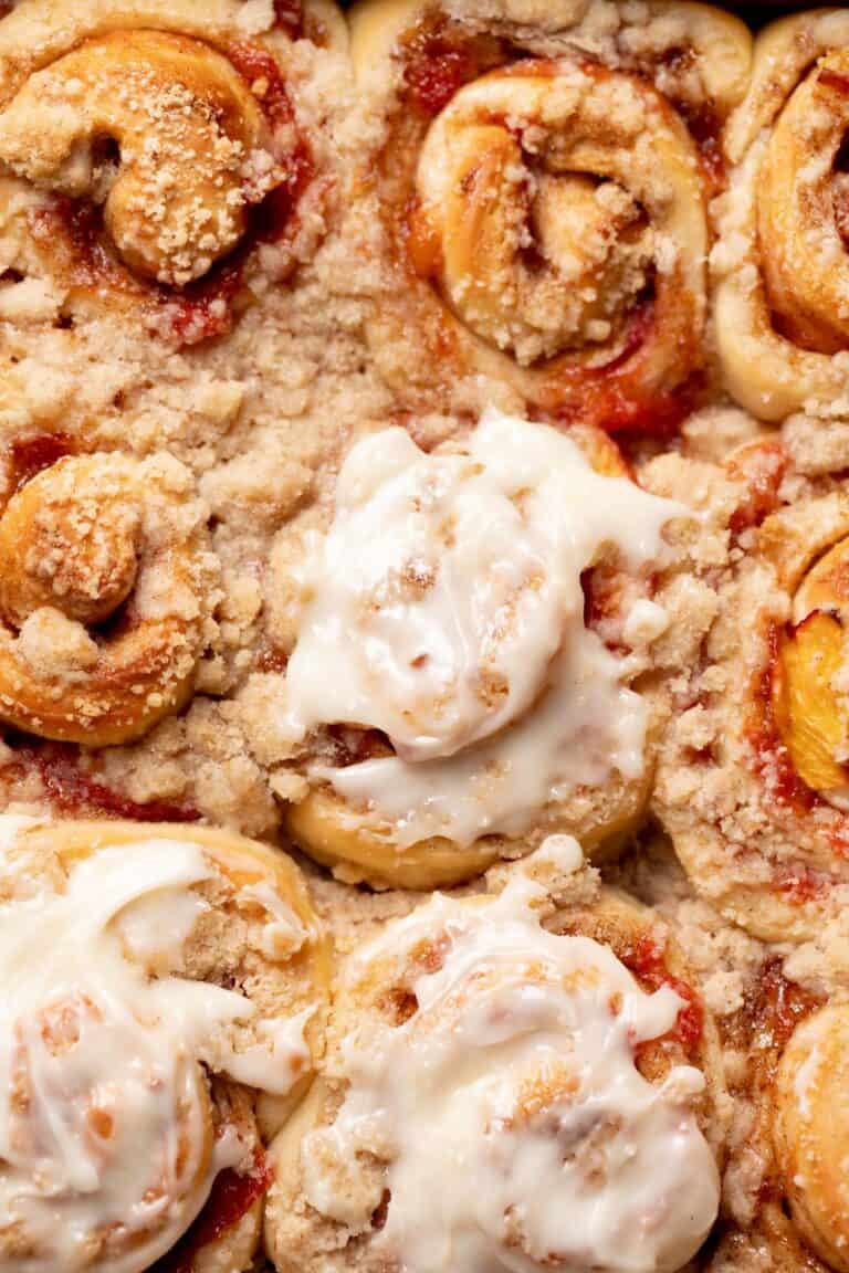 Peach Cobbler Cinnamon Rolls - Cambrea Bakes