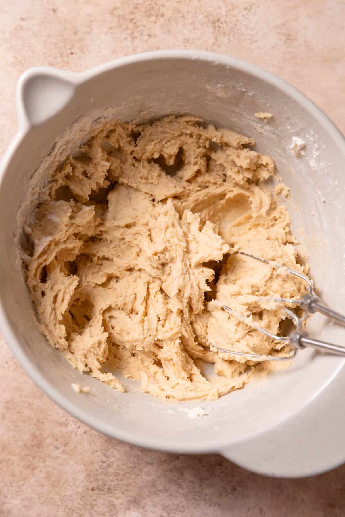 brown sugar cookie dough in a mixing bowl.
