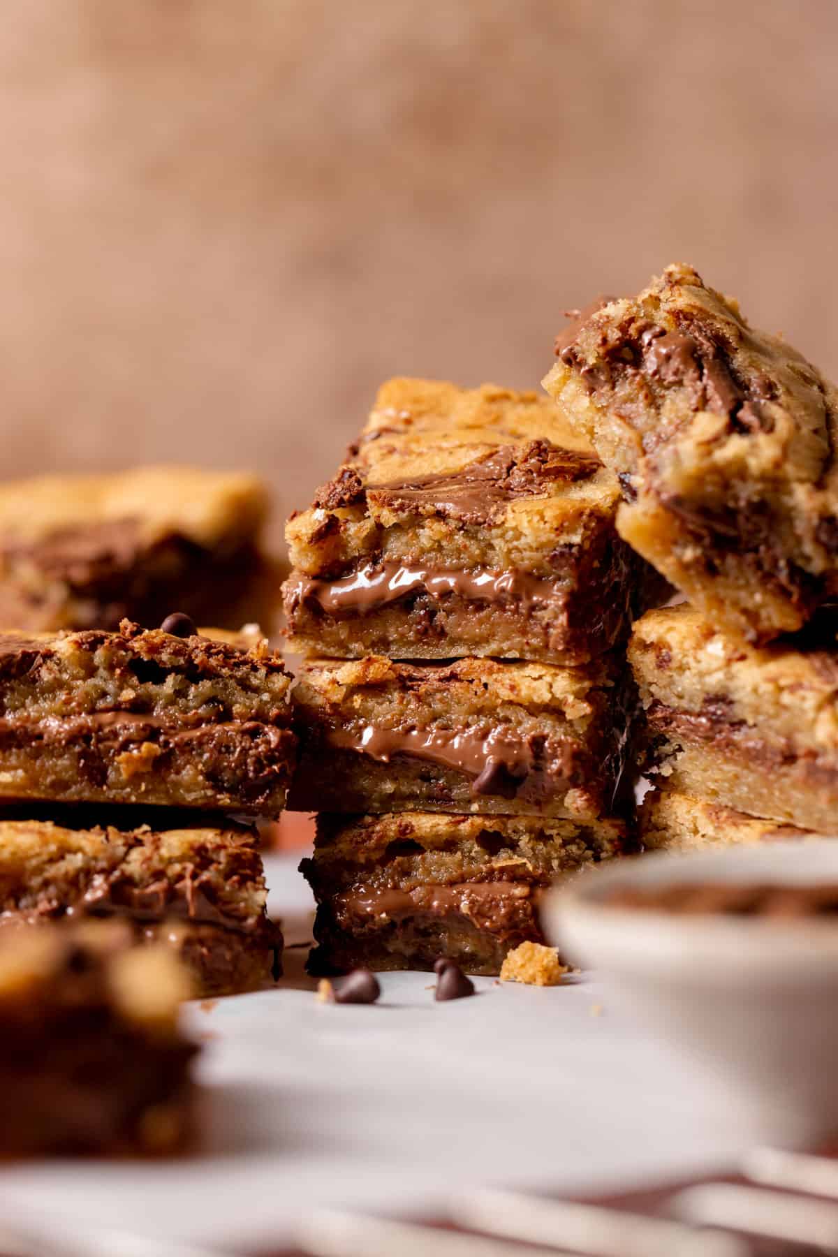 nutella bars stacked on top of each other to show the gooey chocolate filling.