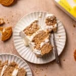 a slice of oatmeal cream pie cake on a plate with a fork.