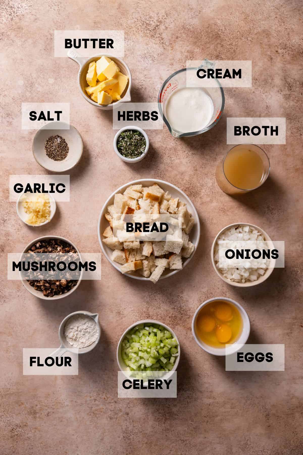 Ingredients needed to make bread pudding casserole in bowls with labels.