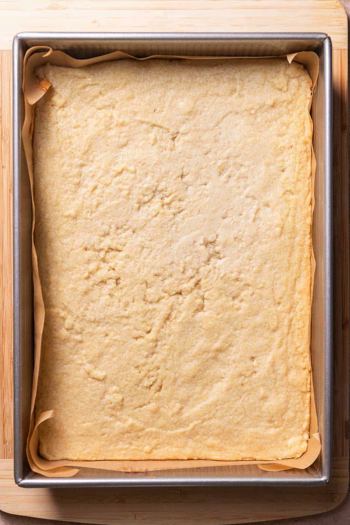 The baked sugar cookie bars in a baking pan.