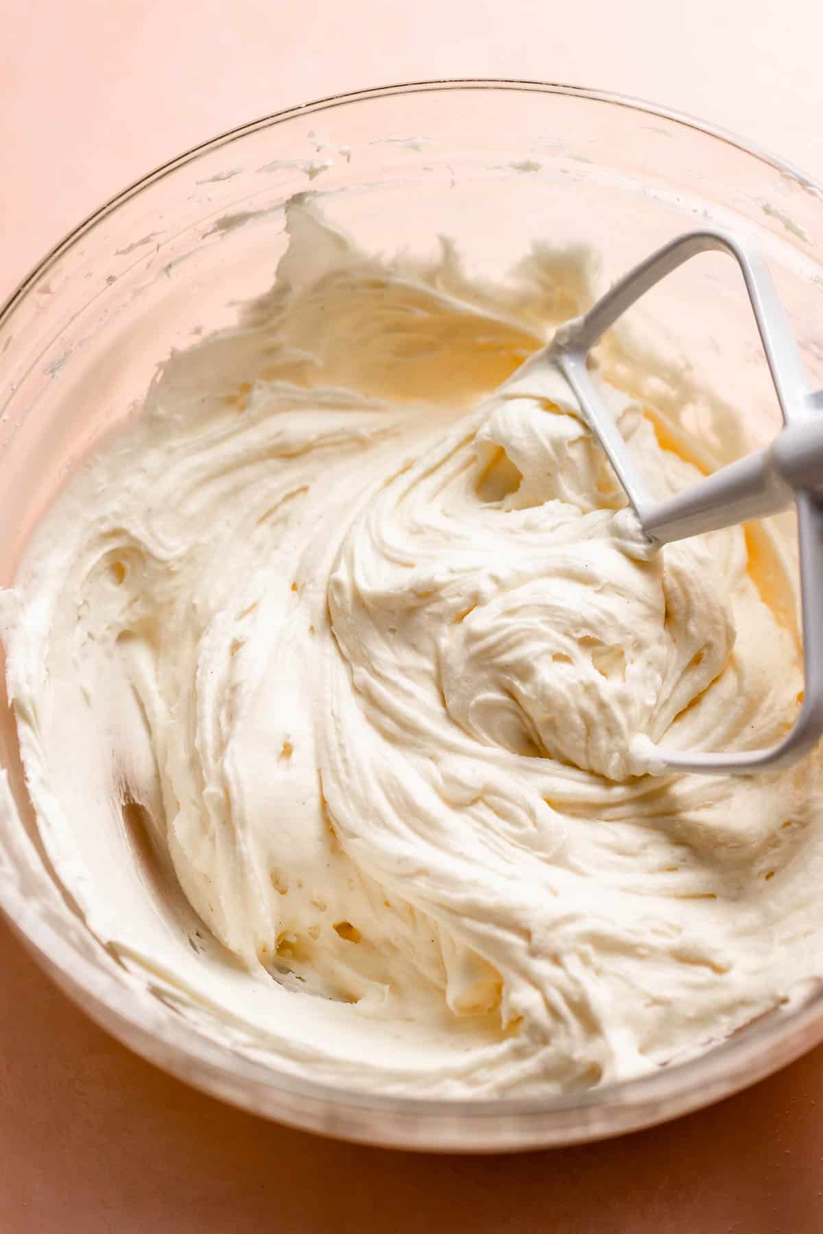 The finished cream cheese buttercream frosting in a bowl.
