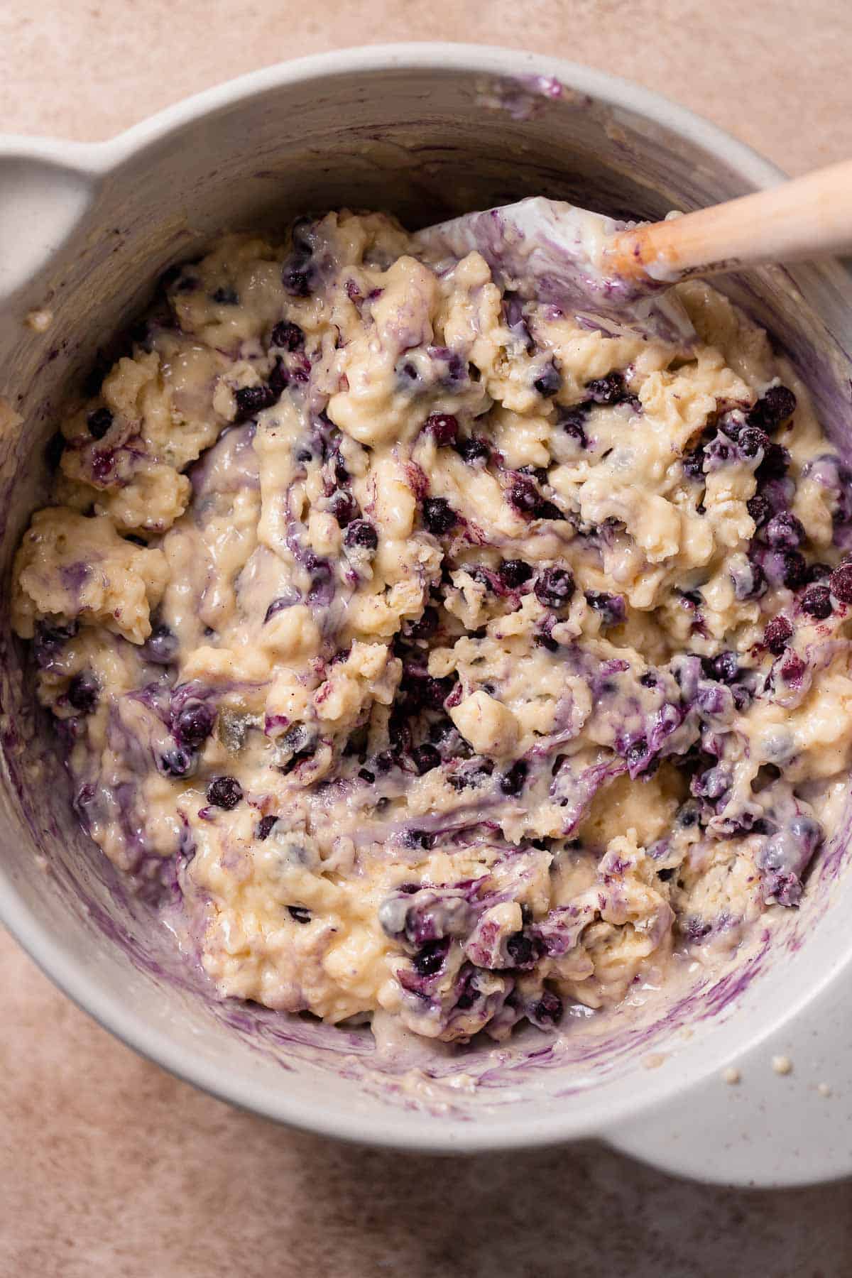 A mixing bowl with the blueberry muffin batter.