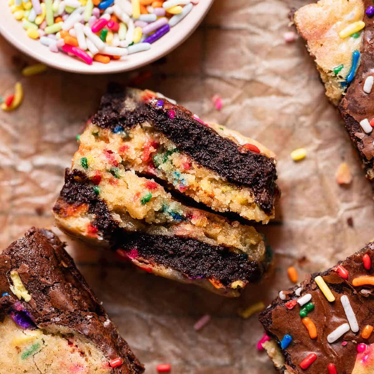 Birthday cake brownie cut in half to show the fudgy texture.