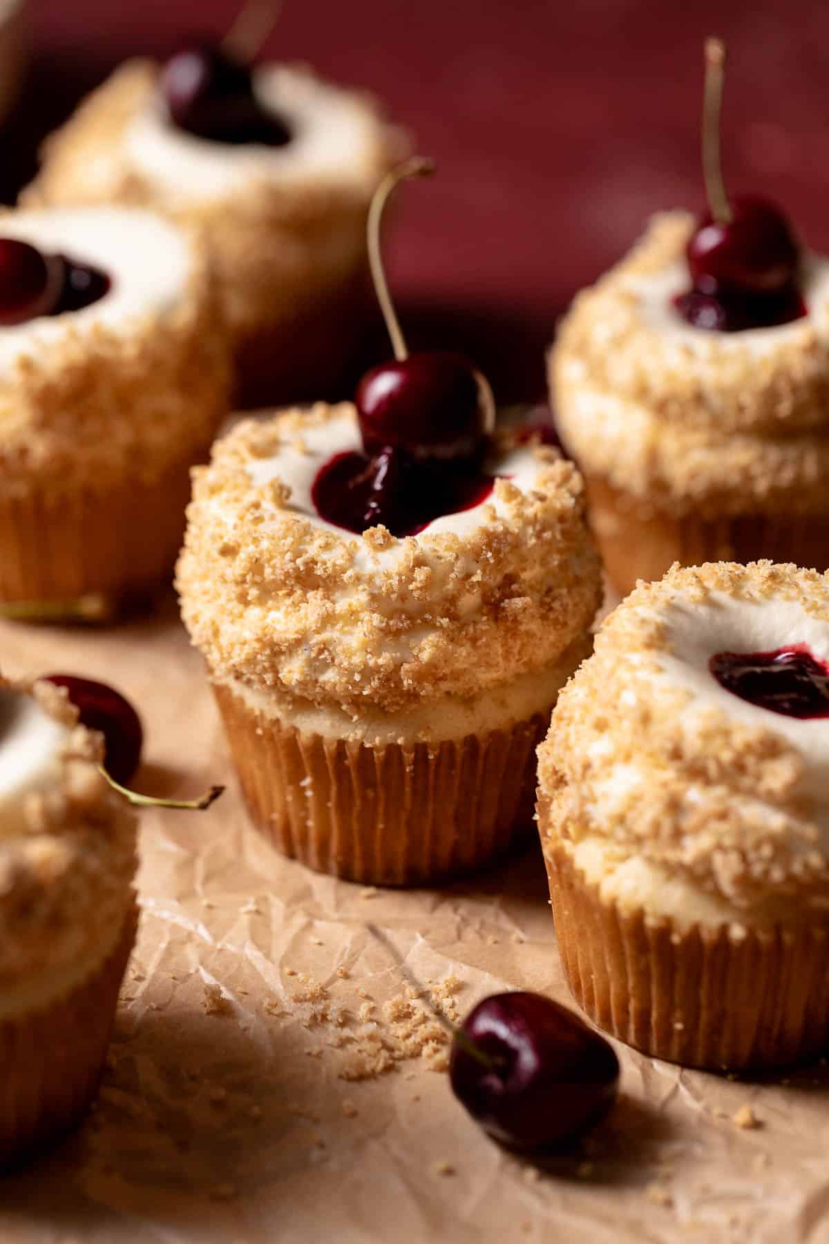 Cherry cupcakes with cherry filling rolled in graham cracker crumbs.