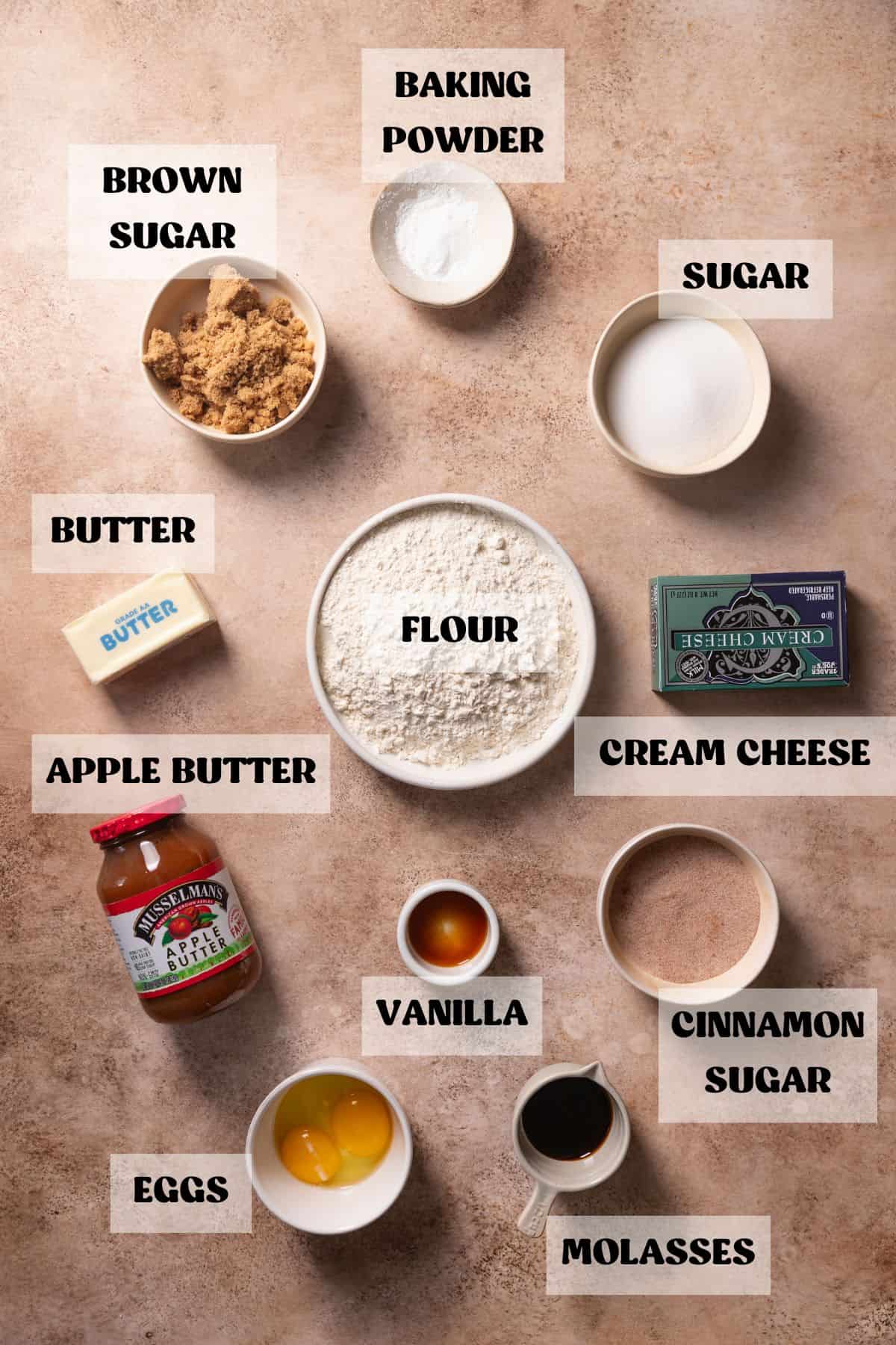 Ingredients need to make snickerdoodles with apple butter in bowls with labels.