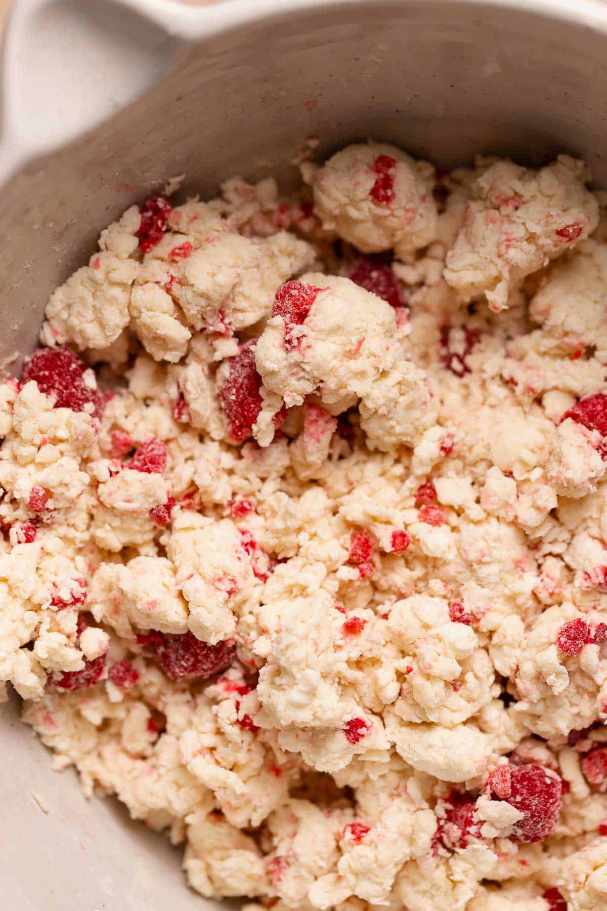 The raspberry scone dough in a large bowl.