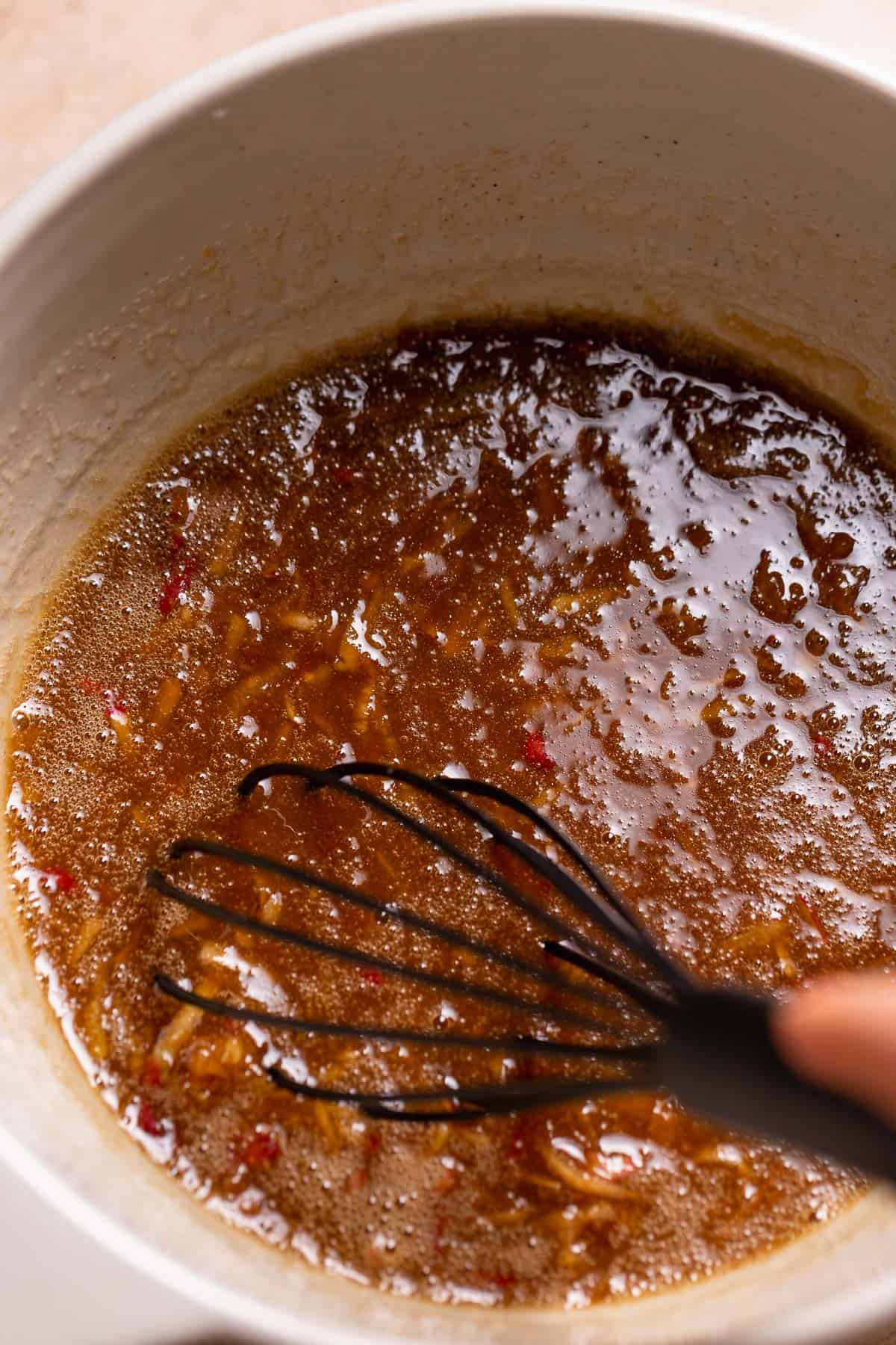 A mixing bowl with the whisked wet ingredients.