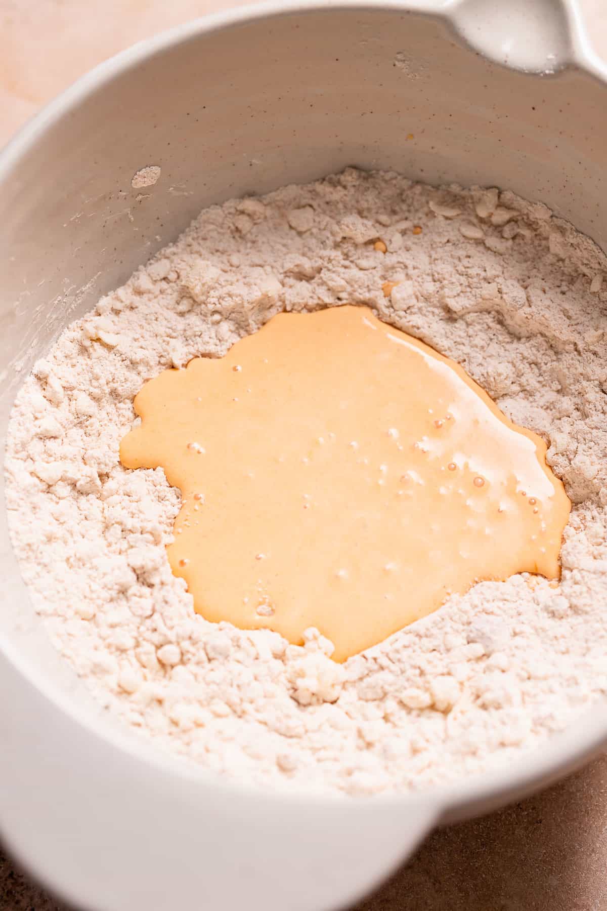 The pumpkin cream mixture poured into the center of the dry ingredients.