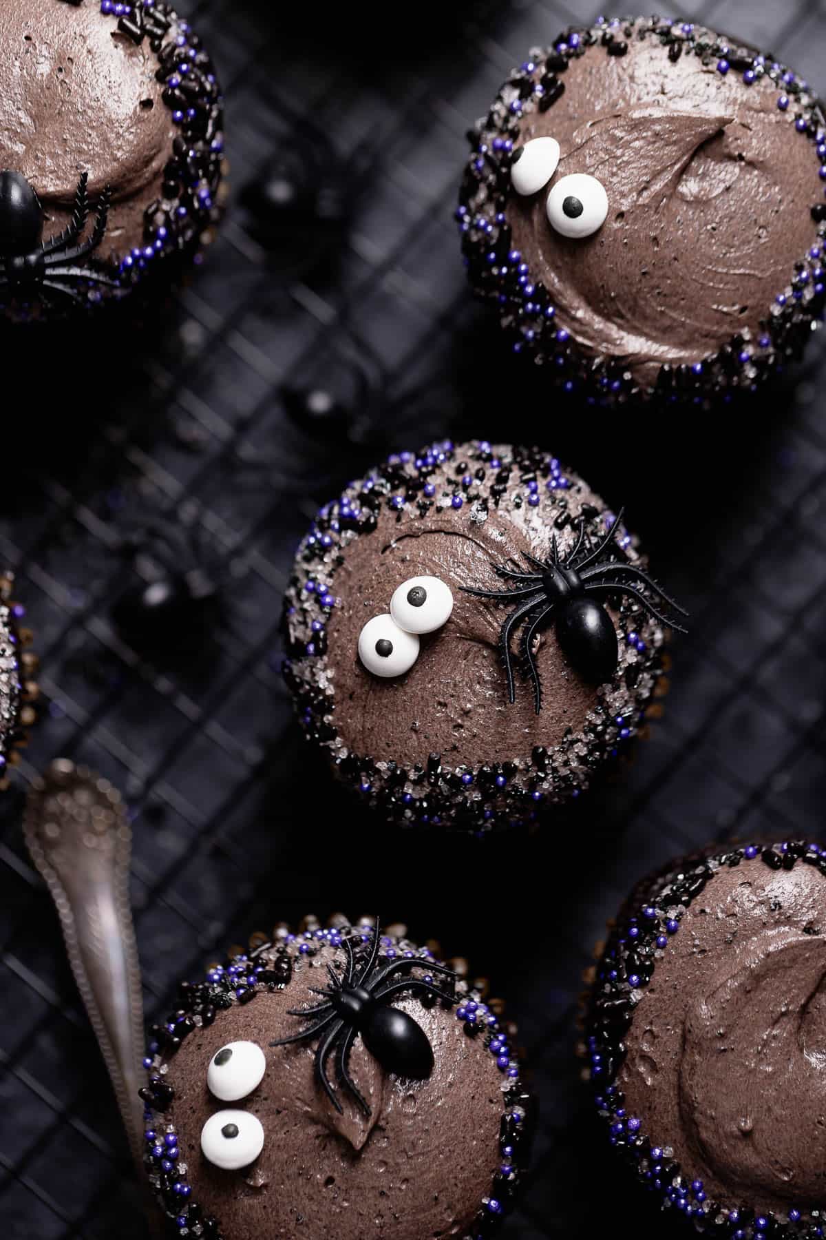 An overhead shot of the black velvet cupcakes with eyeball sprinkles.