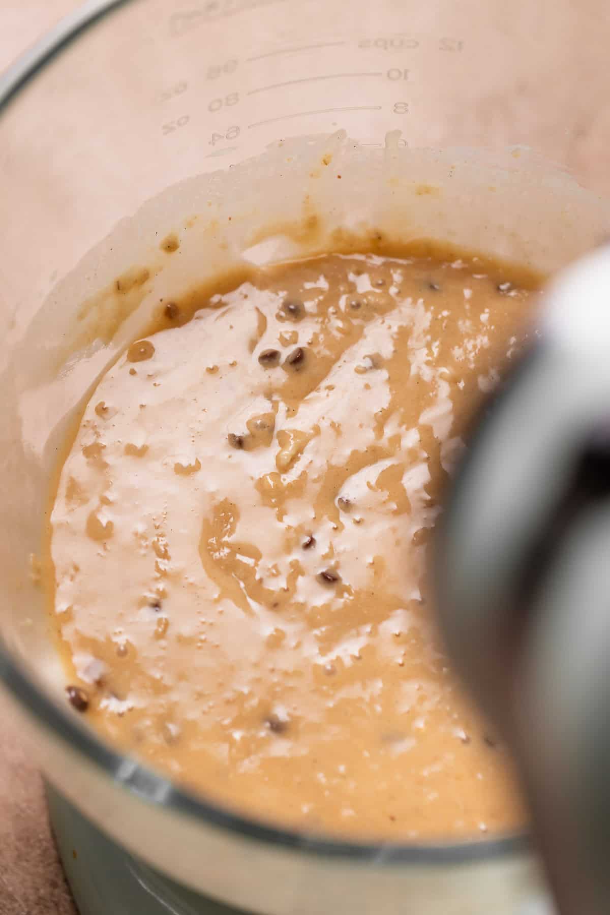 Oatmeal peanut butter cupcake batter in a mixing bowl.