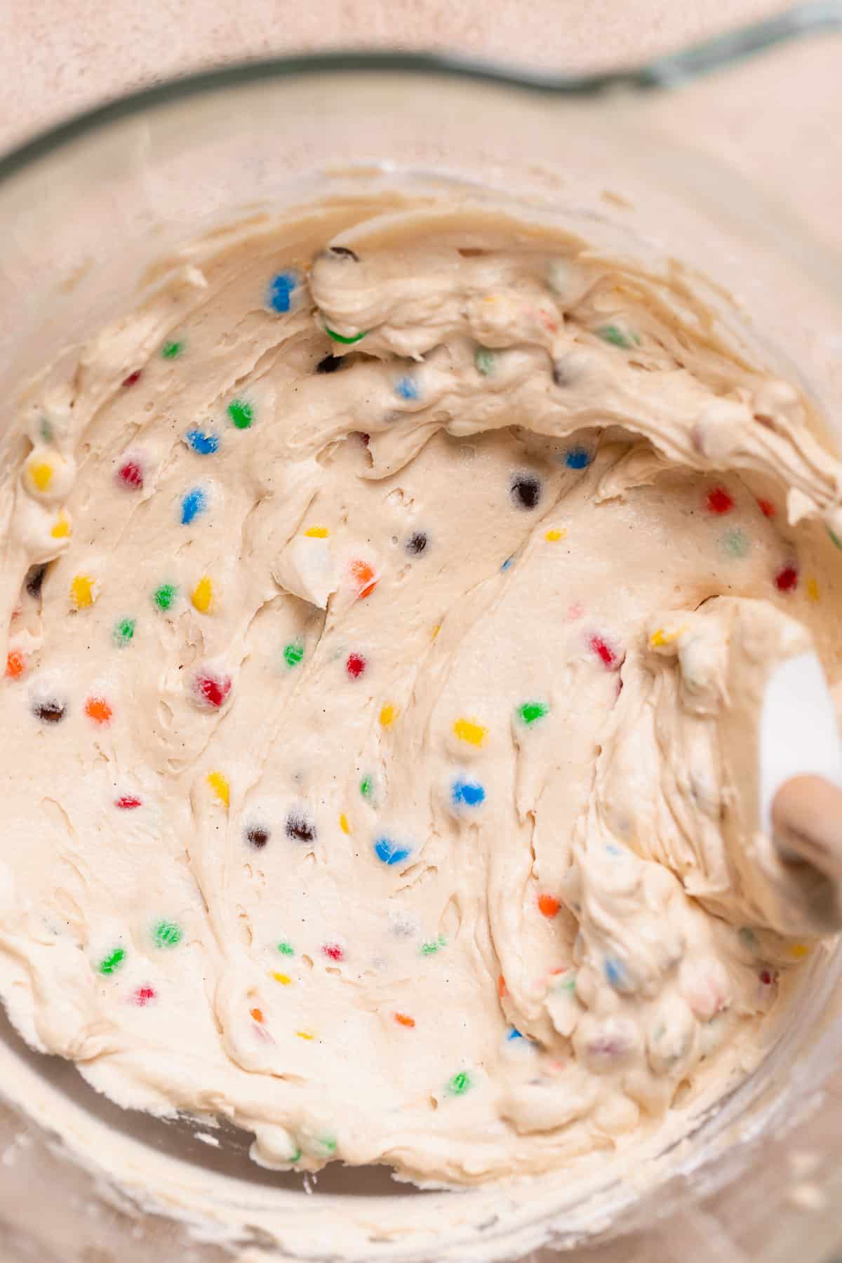 A mixing bowl with the M&M buttercream frosting.