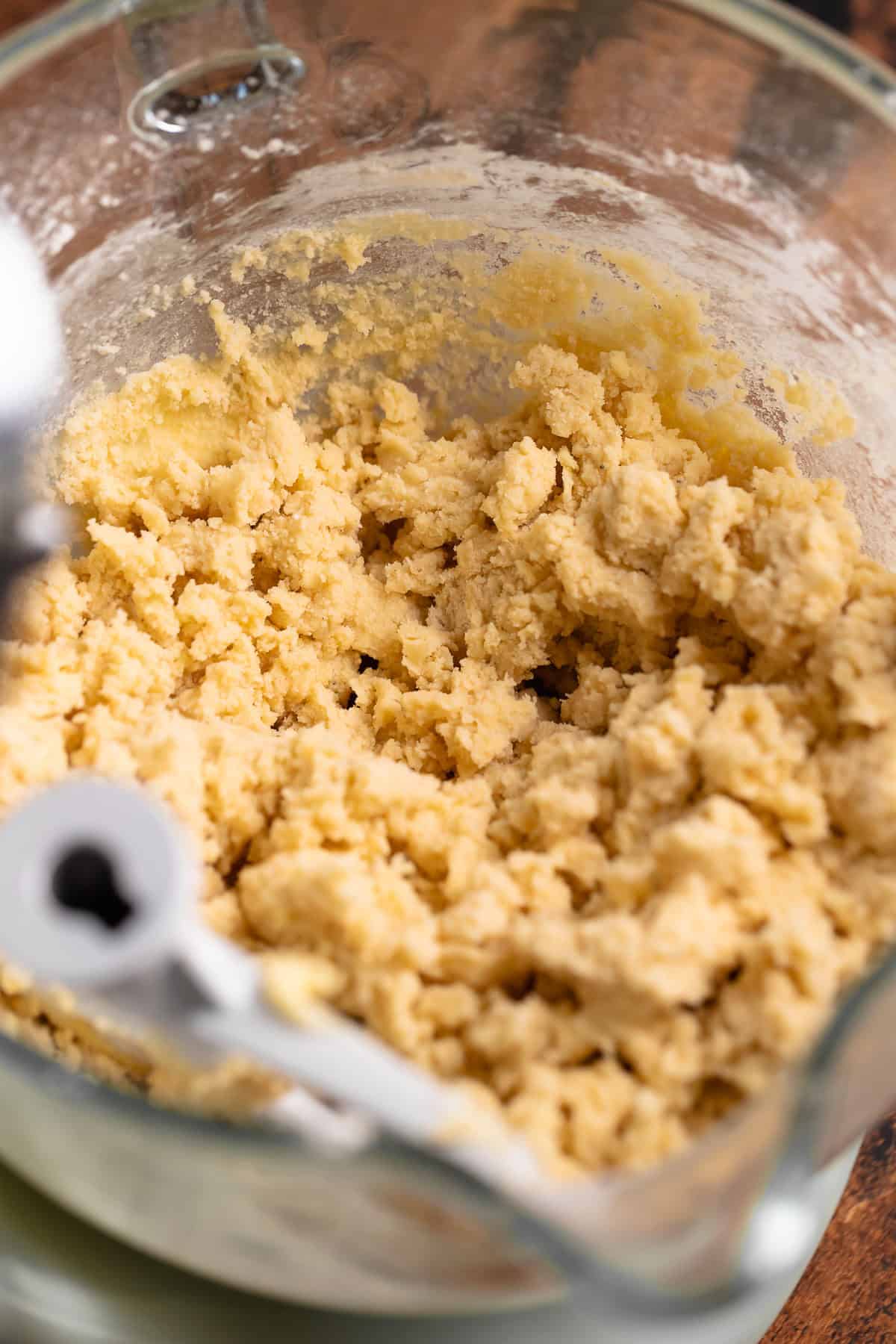 Sugar cookie dough in a mixing bowl.