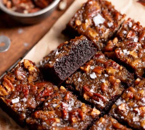 Brownies with pecan pie topping cut into bars.