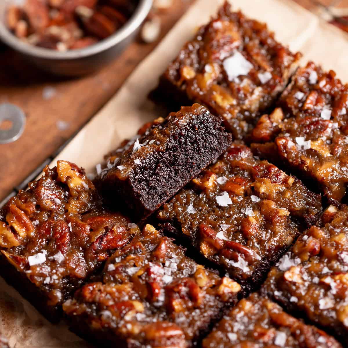 Brownies with pecan pie topping cut into bars.